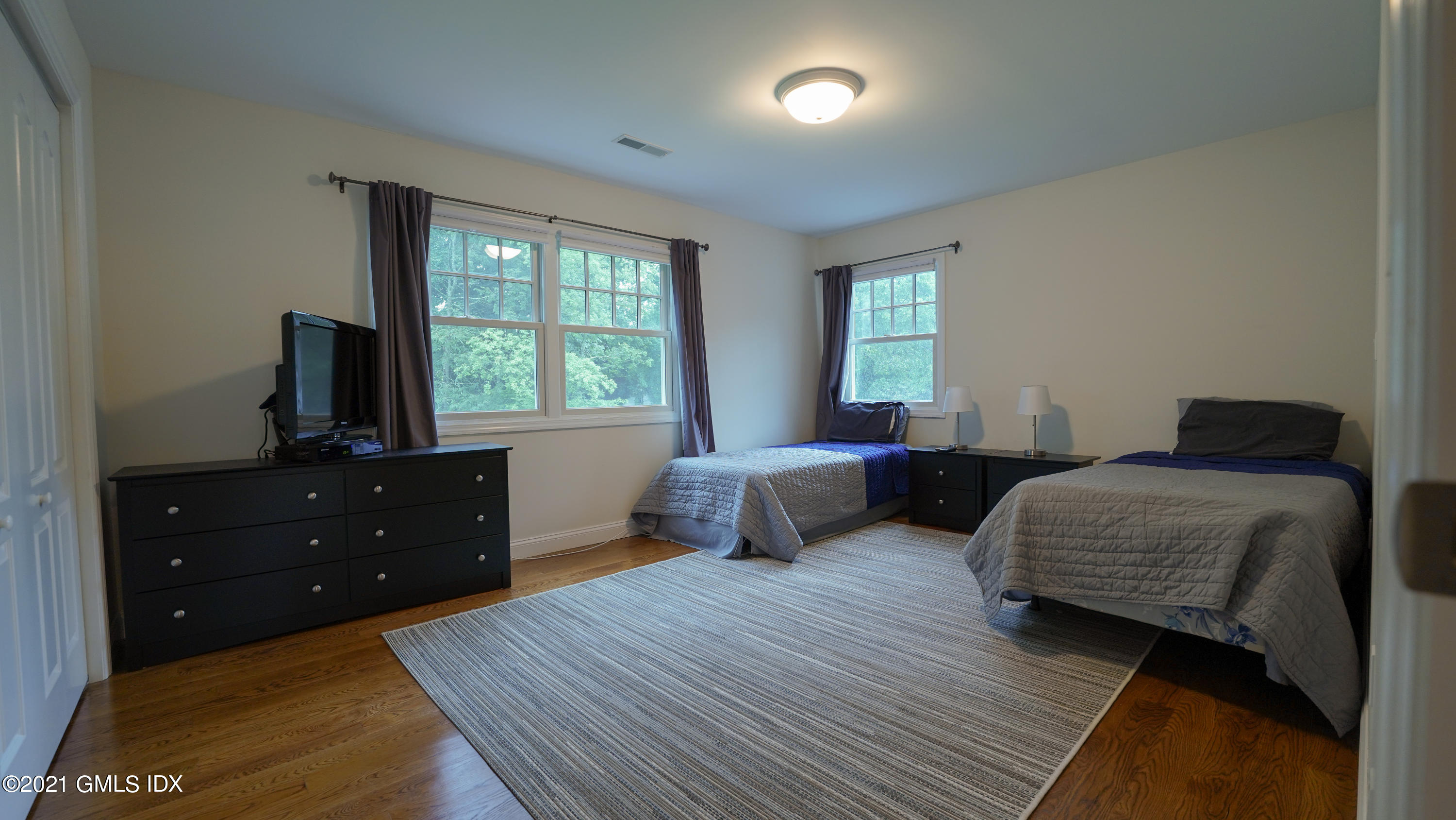 20 Sunshine Avenue Riverside, CT 06878 - Photo 35 of 39 a bedroom with two beds and a window