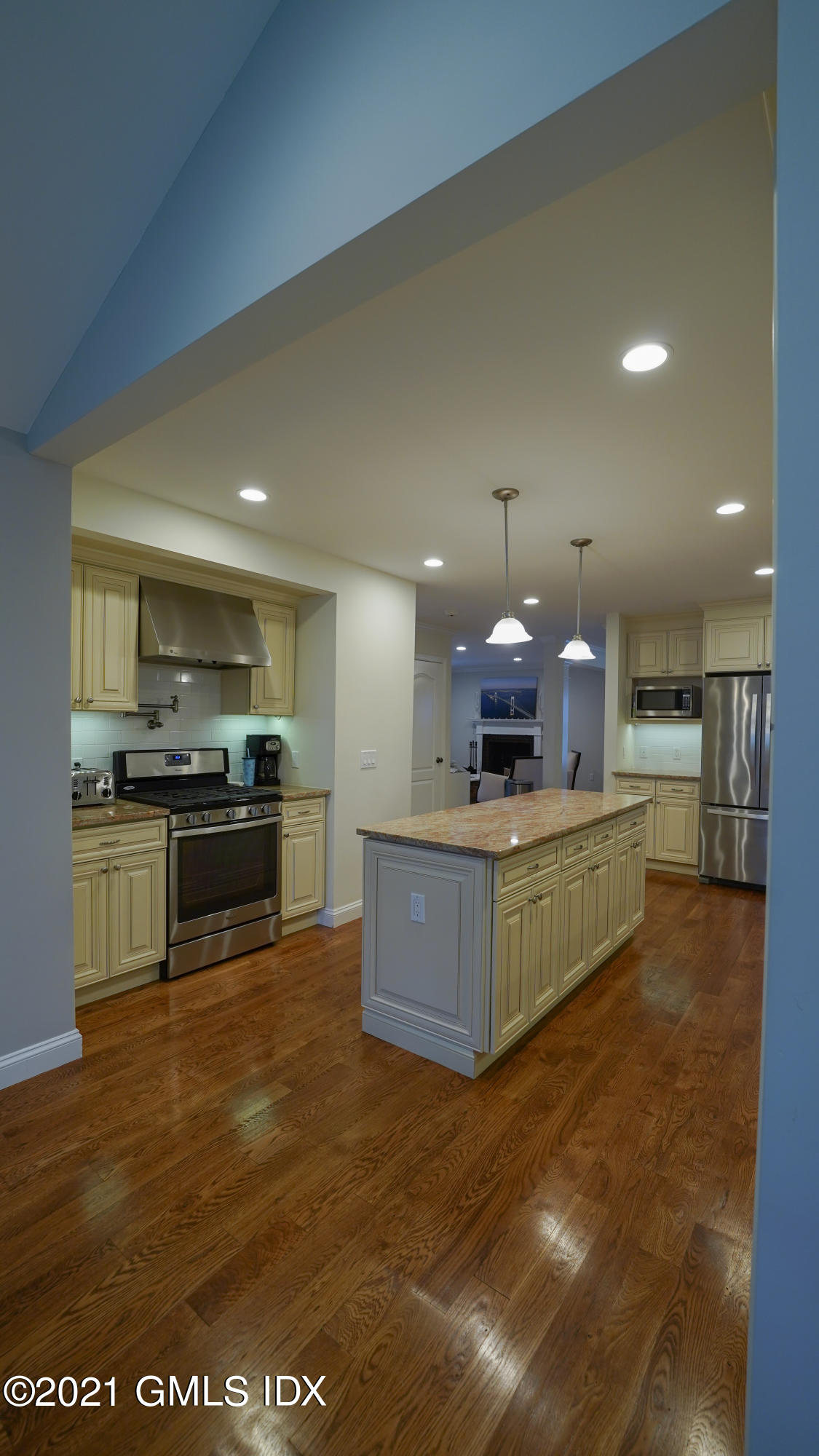 20 Sunshine Avenue Riverside, CT 06878 - Photo 10 of 39 a kitchen with a sink and a stove top oven