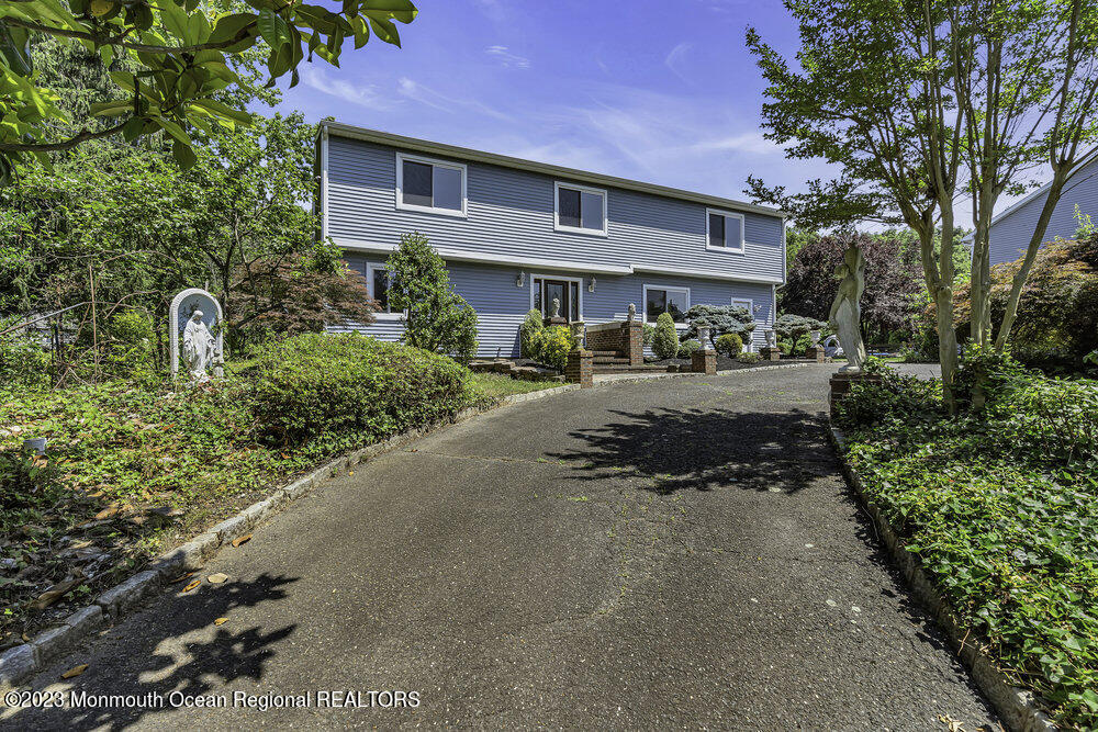 77 Farrington Road Old Bridge, NJ 07747 - Photo 17 of 33 a front view of a house with a yard