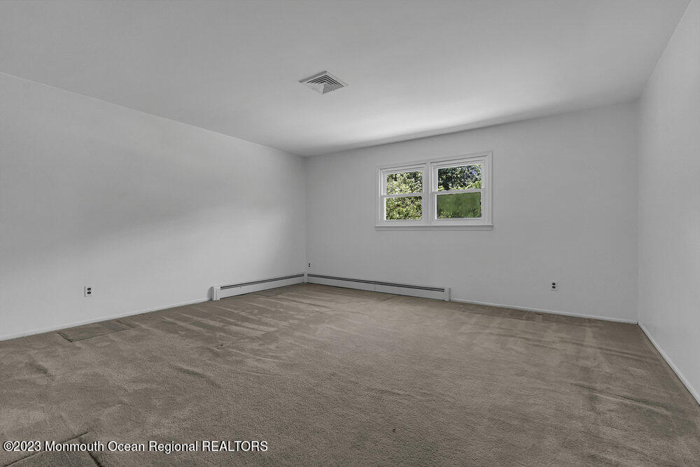 77 Farrington Road Old Bridge, NJ 07747 - Photo 25 of 33 an empty room with windows