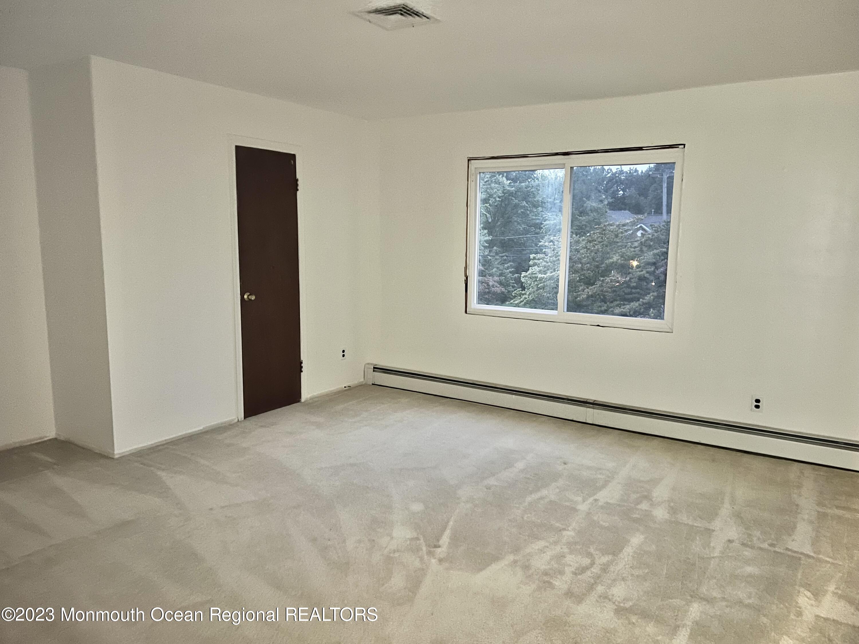 77 Farrington Road Old Bridge, NJ 07747 - Photo 28 of 33 an empty room with windows