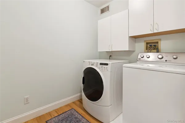 a utility room with dryer and washer