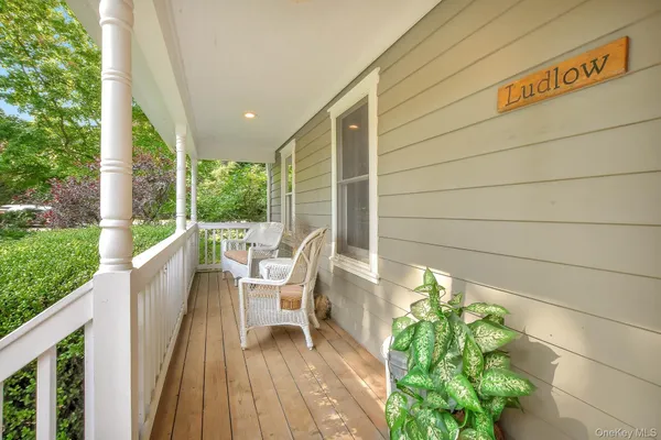 a balcony with wooden floor