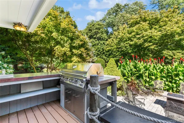 a view of a balcony with chairs
