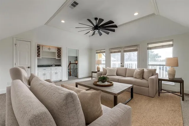 a large kitchen with a table and chairs