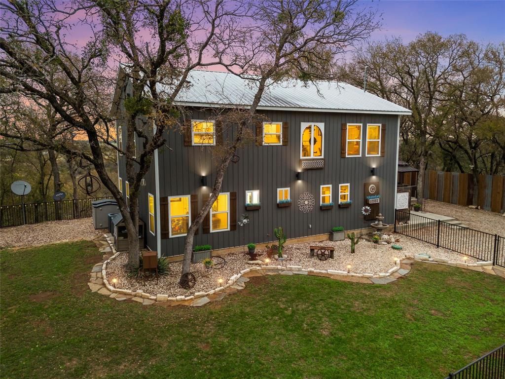 1307 Range Road China Spring, TX 76633 - Photo 1 of 40 a front view of a house with a yard