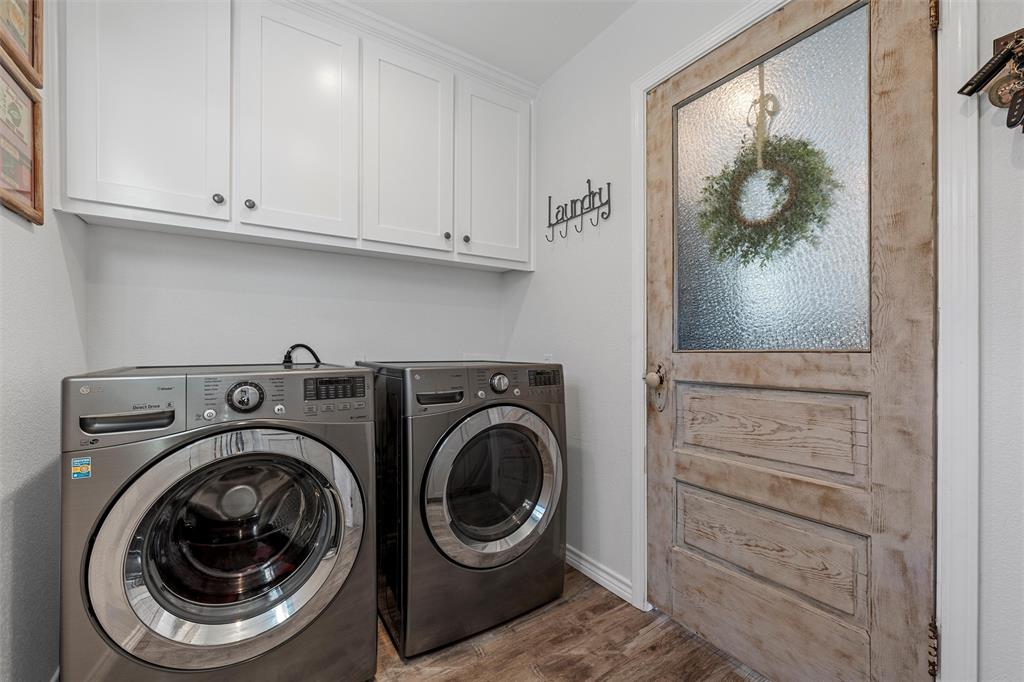 1307 Range Road China Spring, TX 76633 - Photo 15 of 40 a utility room with dryer and washer