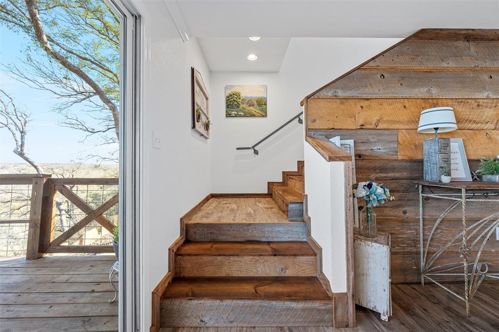 1307 Range Road China Spring, TX 76633 - Photo 16 of 40 a view of entryway with wooden floor and a front door