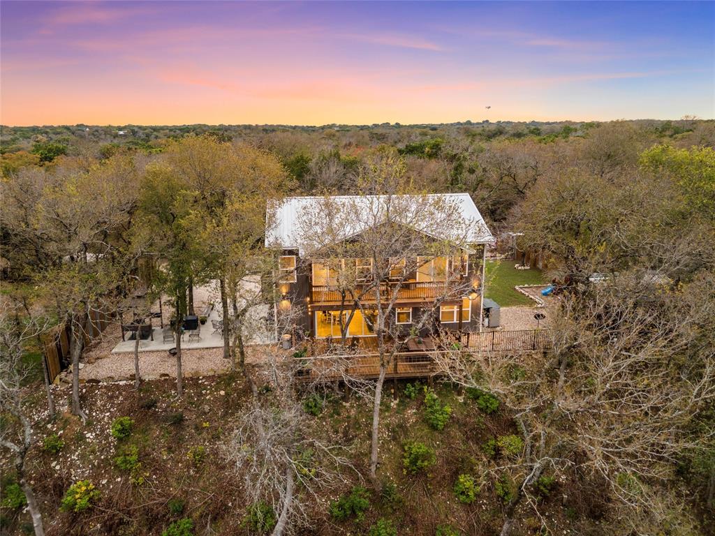 1307 Range Road China Spring, TX 76633 - Photo 3 of 40 a view of a city with lush green forest