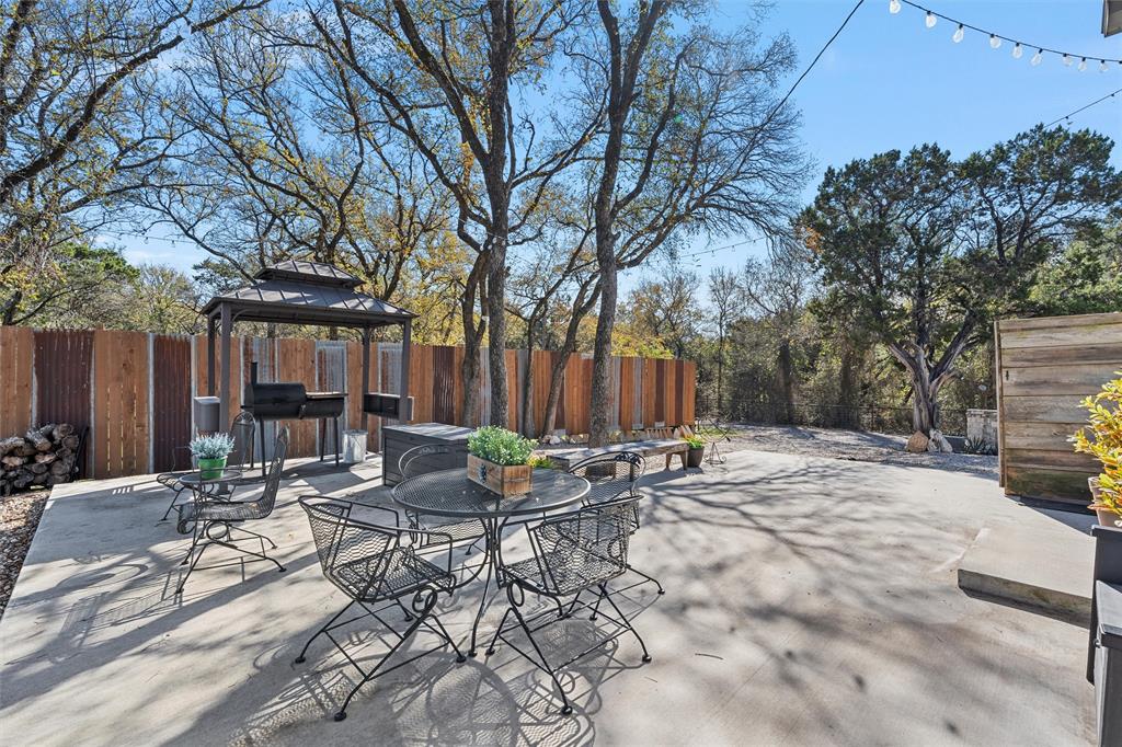 1307 Range Road China Spring, TX 76633 - Photo 31 of 40 a view of backyard with patio and outdoor seating
