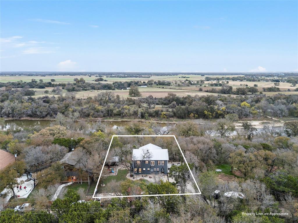 1307 Range Road China Spring, TX 76633 - Photo 37 of 40 an aerial view of a house with a yard