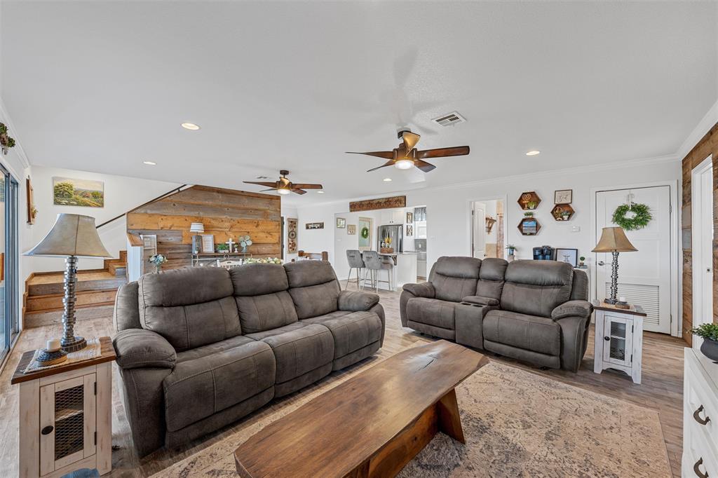 1307 Range Road China Spring, TX 76633 - Photo 7 of 40 a living room with furniture and a flat screen tv