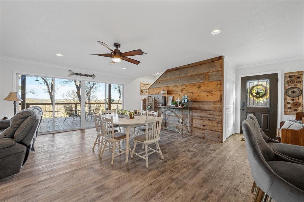 1307 Range Road China Spring, TX 76633 - Photo 8 of 40 a dining room with furniture window and wooden floor