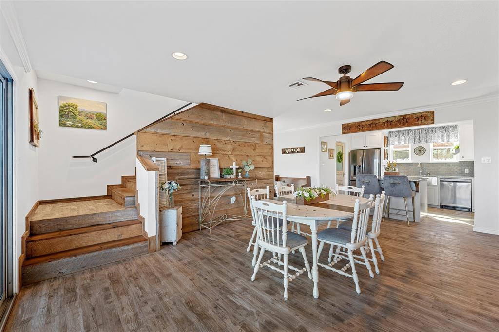 1307 Range Road China Spring, TX 76633 - Photo 9 of 40 a view of a dining room with furniture window and wooden floor