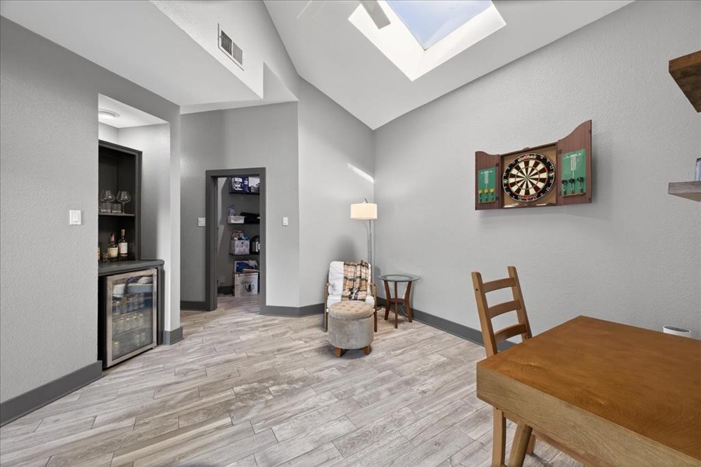 2934 North Bend Drive Dallas, TX 75229 - Photo 20 of 30 a workspace room with furniture and wooden floor