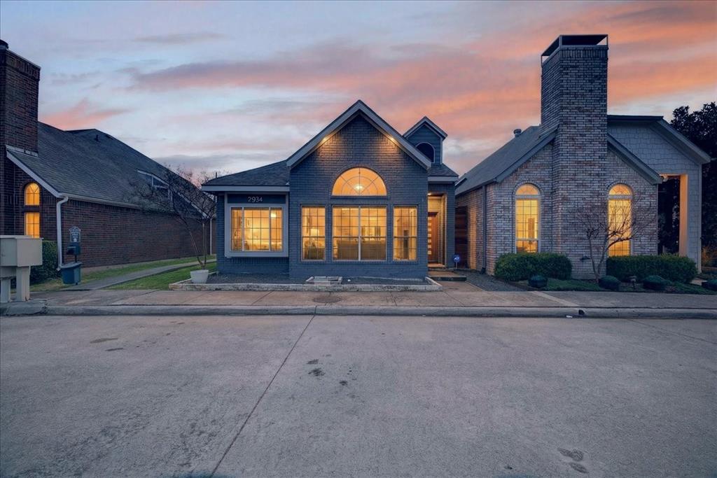 2934 North Bend Drive Dallas, TX 75229 - Photo 5 of 30 a front view of a house with a yard