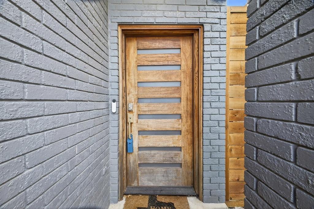 2934 North Bend Drive Dallas, TX 75229 - Photo 6 of 30 a view of front door and wooden floor