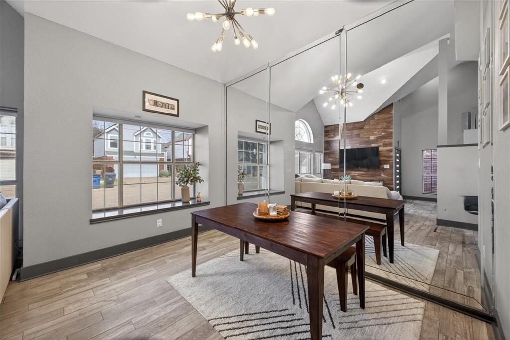 2934 North Bend Drive Dallas, TX 75229 - Photo 10 of 30 a view of a dining room with furniture window and wooden floor