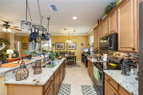 $595,000 | 13631 Messino Court, Estero, FL 33928