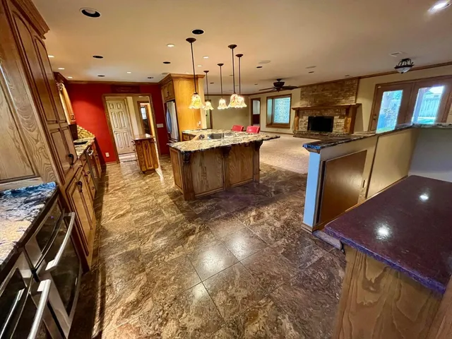a view of a kitchen with washer and dryer