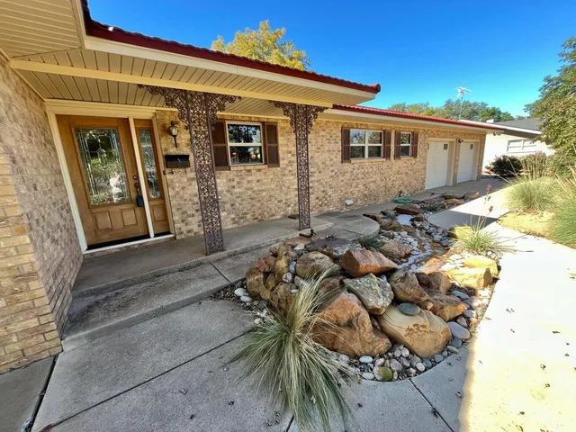 a view of a house with a patio
