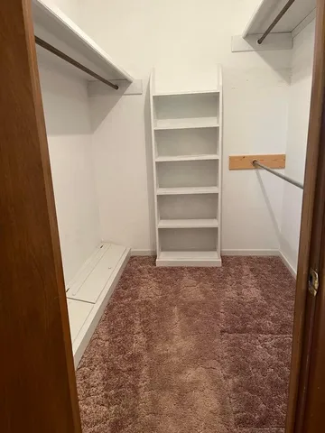 a view of a bathroom with a toilet