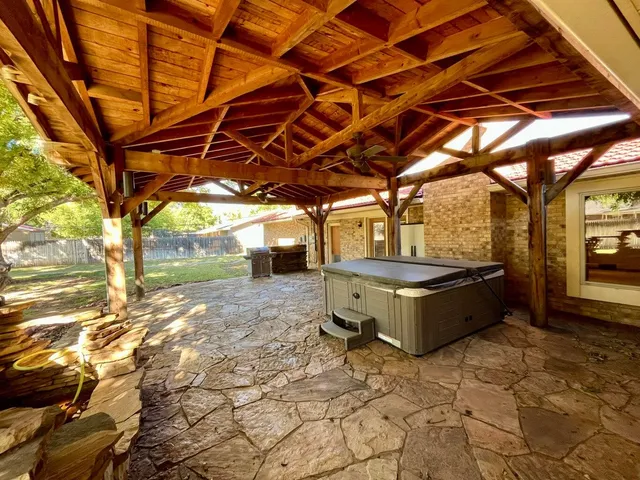 a swimming pool with wooden fence