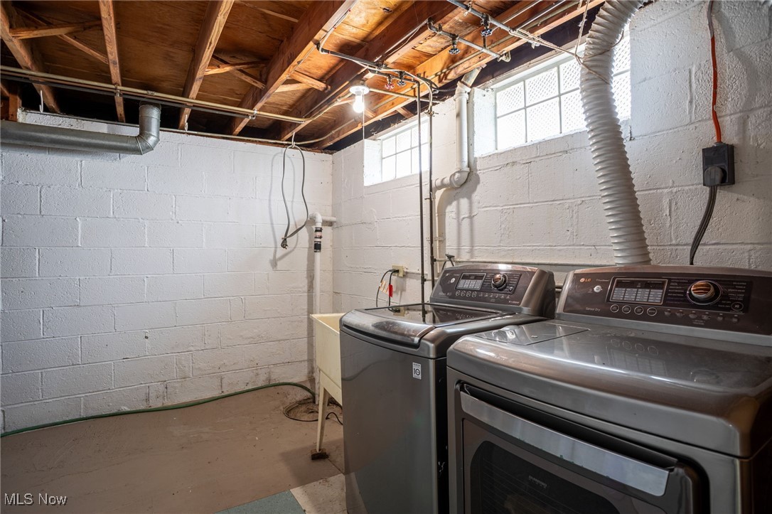 12972 West Sprague Road Cleveland, OH 44130 - Photo 18 of 23 Laundry area featuring washing machine and dryer