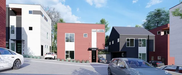 a couple of cars parked in front of a house