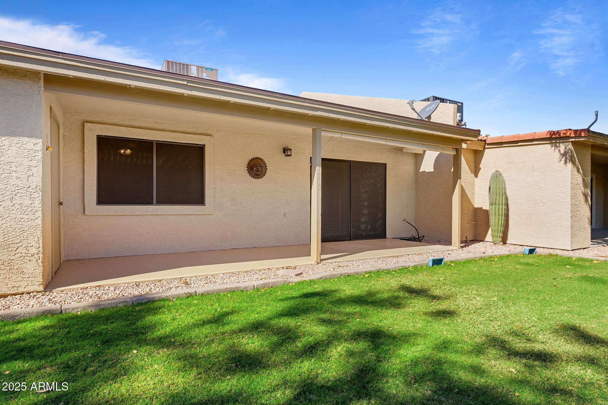 1021 South Greenfield Road, Unit 1148 Mesa, AZ 85206 - Photo 13 of 14 a view of a house with backyard