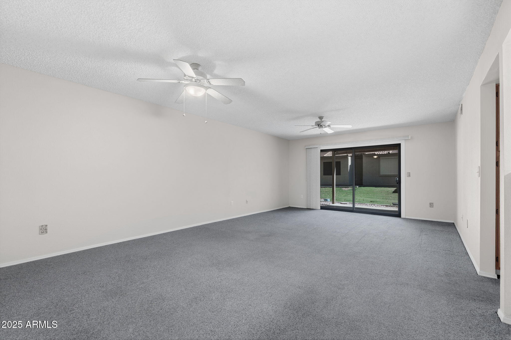 1021 South Greenfield Road, Unit 1148 Mesa, AZ 85206 - Photo 3 of 14 wooden floor in an empty room