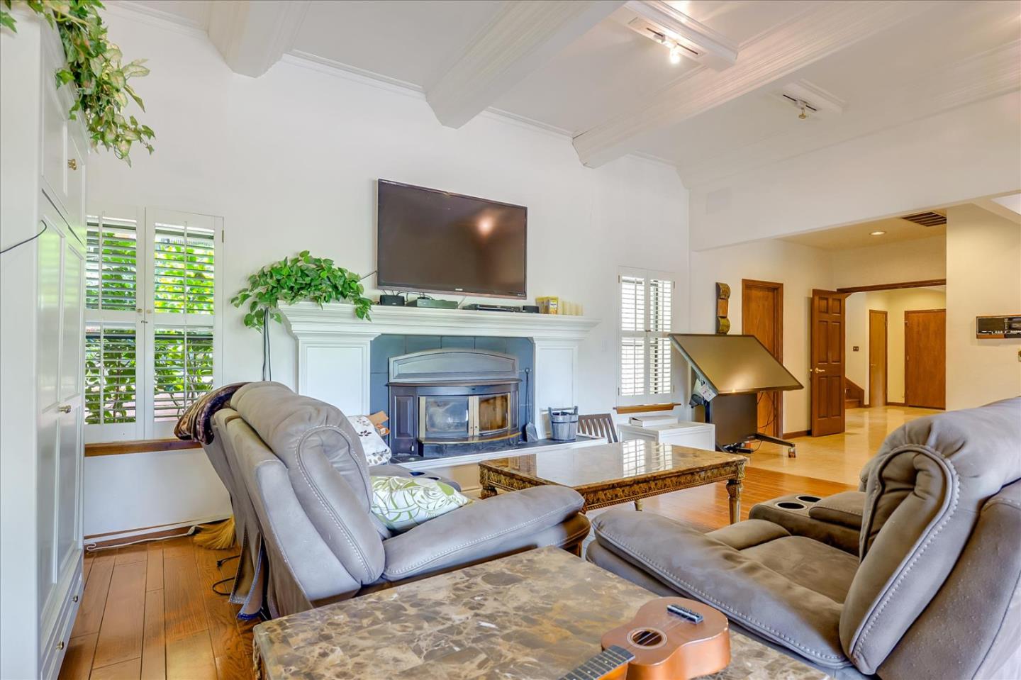35 Echo Lane Woodside, CA 94062 - Photo 11 of 54 a living room with furniture fireplace and flat screen tv