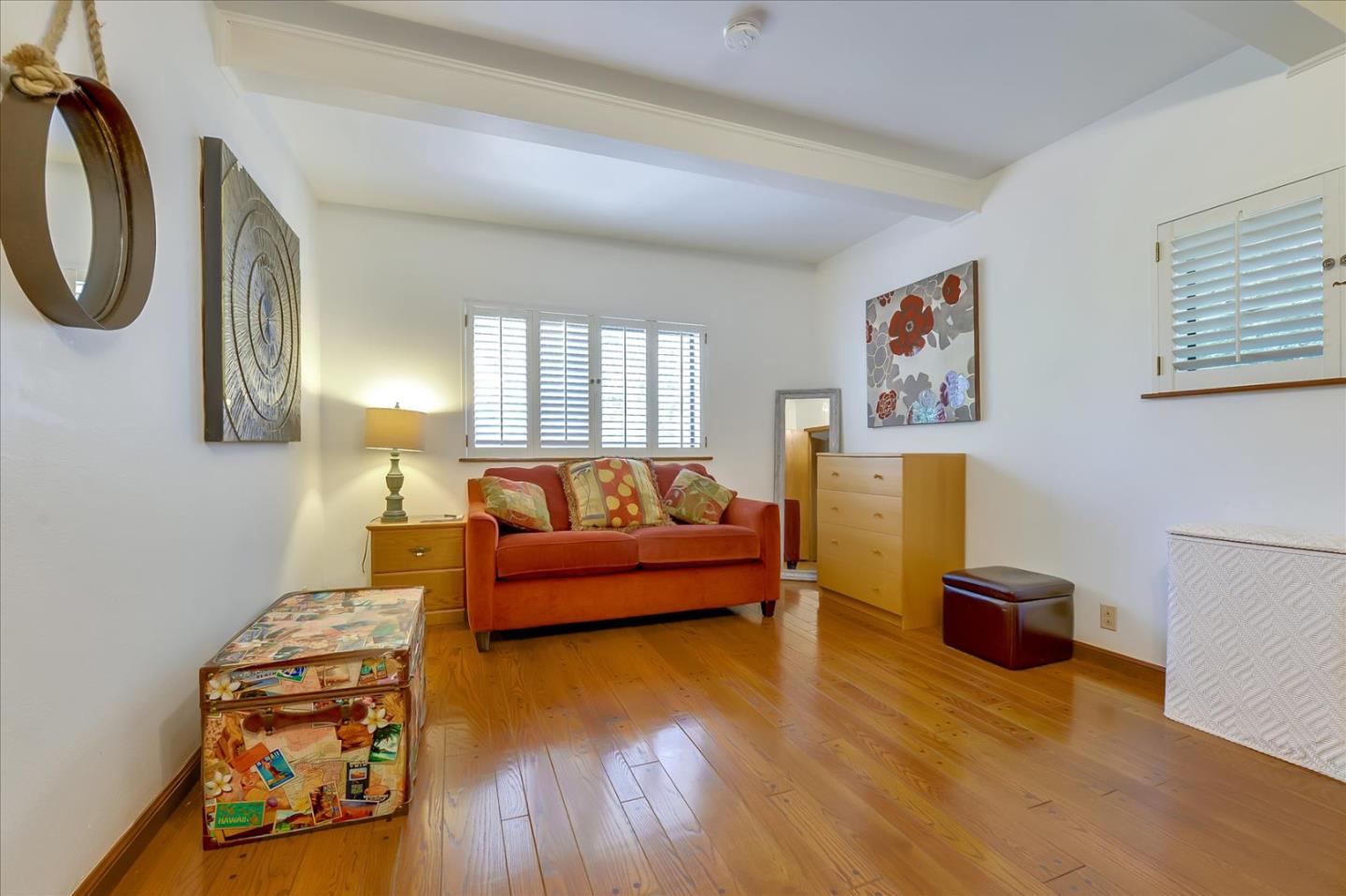35 Echo Lane Woodside, CA 94062 - Photo 18 of 54 a living room with furniture and a wooden floor