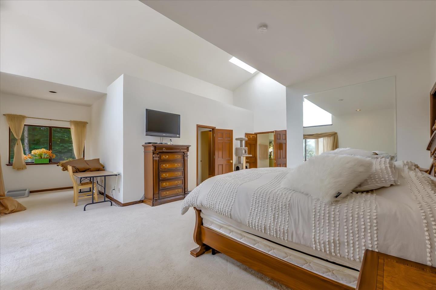 35 Echo Lane Woodside, CA 94062 - Photo 29 of 54 a bedroom with a bed and a television
