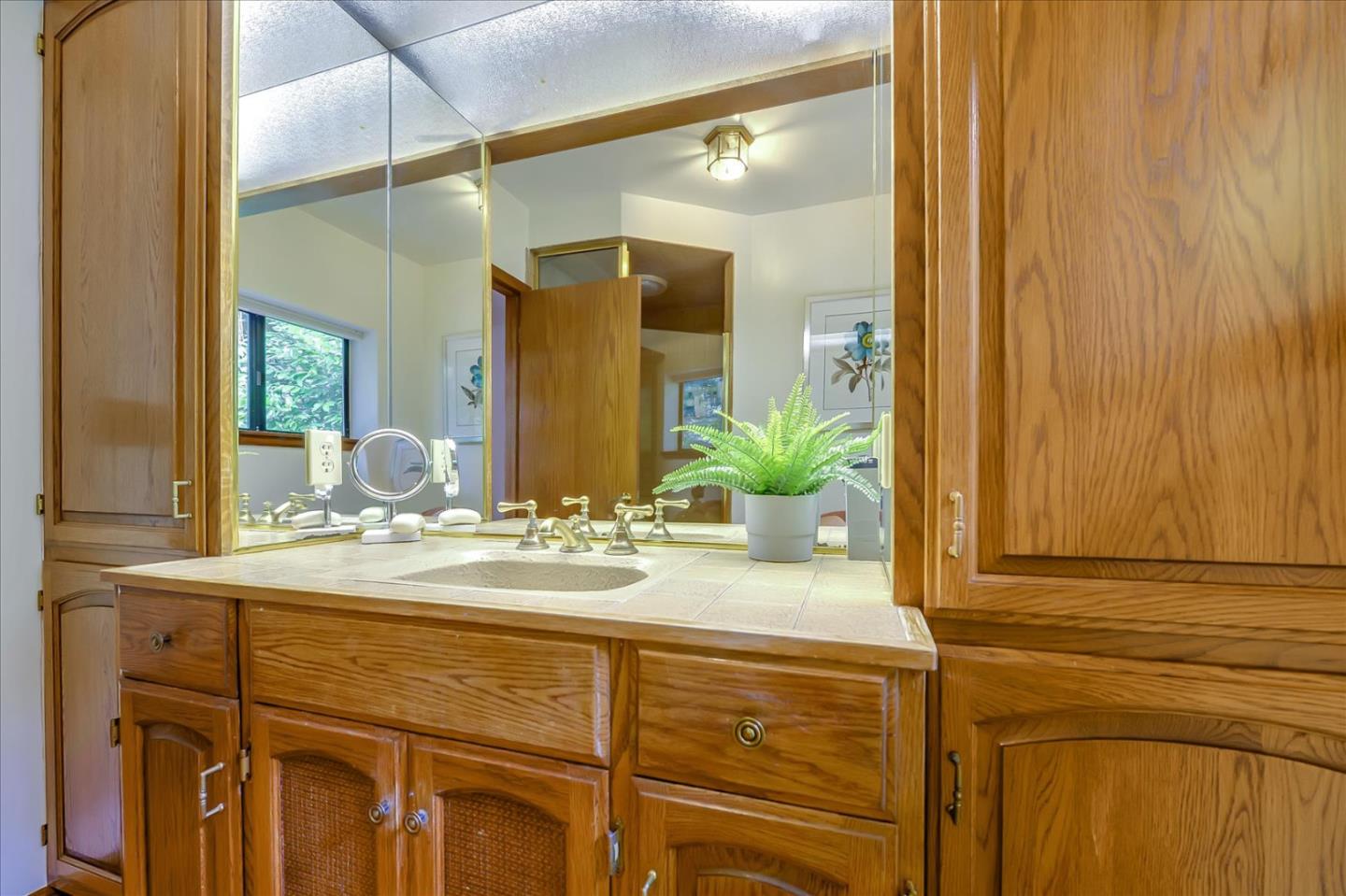 35 Echo Lane Woodside, CA 94062 - Photo 36 of 54 a bathroom with a sink and a mirror
