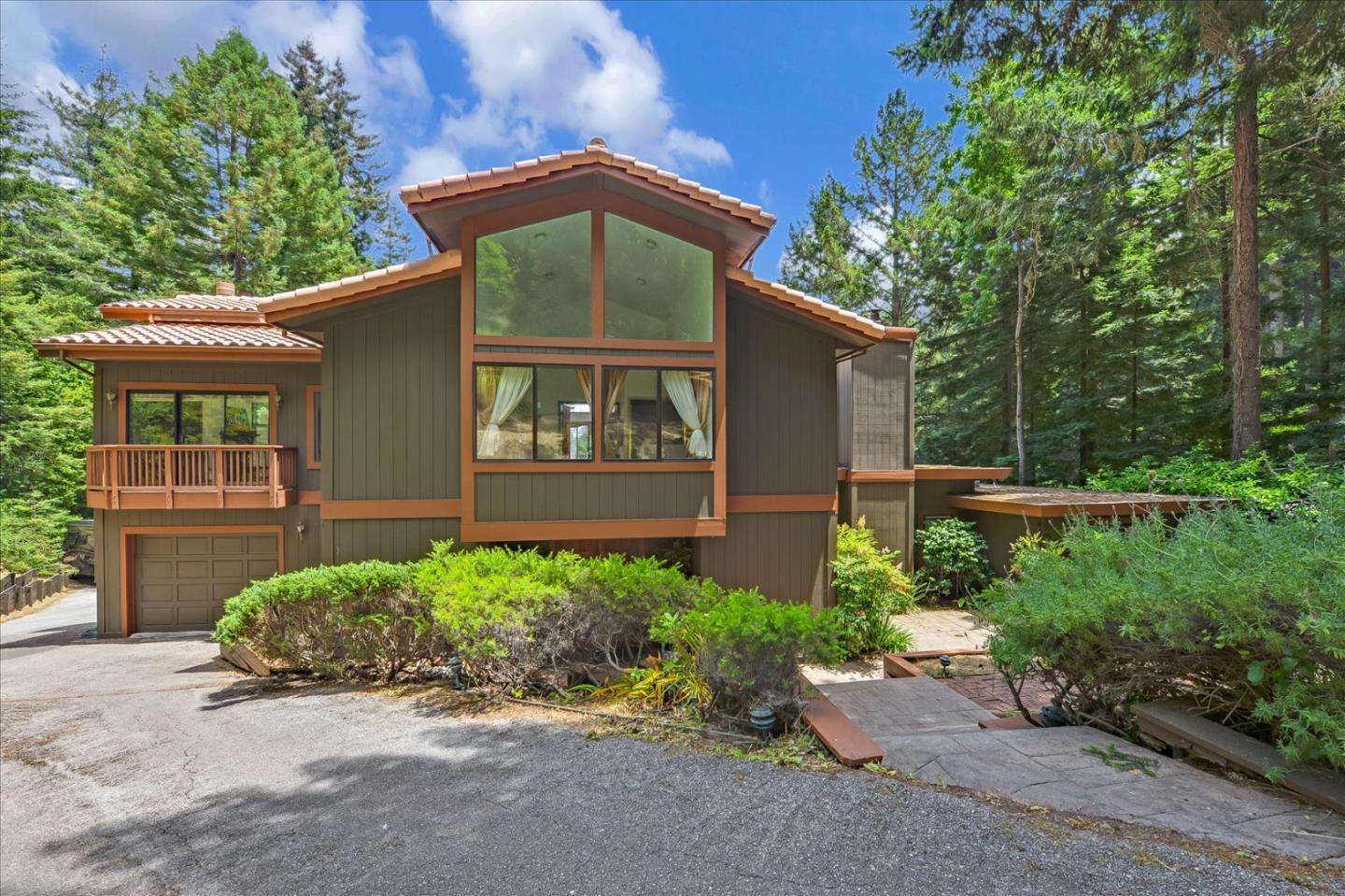 35 Echo Lane Woodside, CA 94062 - Photo 4 of 54 front view of a house with a yard