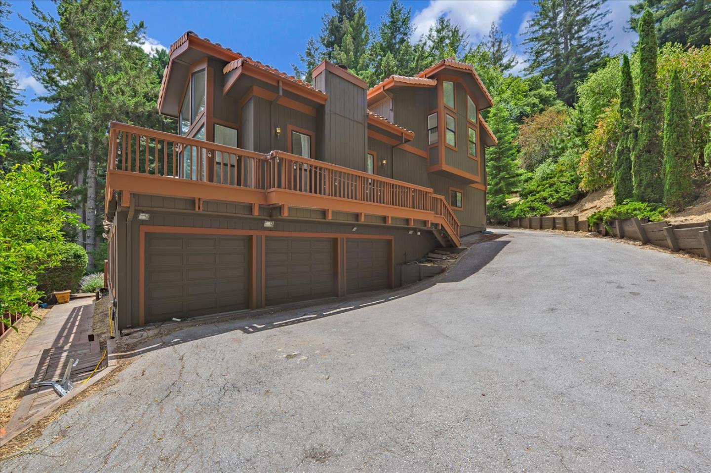 35 Echo Lane Woodside, CA 94062 - Photo 48 of 54 a view of a house with a yard and garage