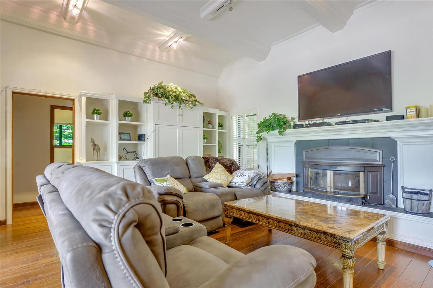 35 Echo Lane Woodside, CA 94062 - Photo 9 of 54 a living room with furniture fireplace and flat screen tv