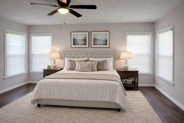 a bedroom with a bed and a table