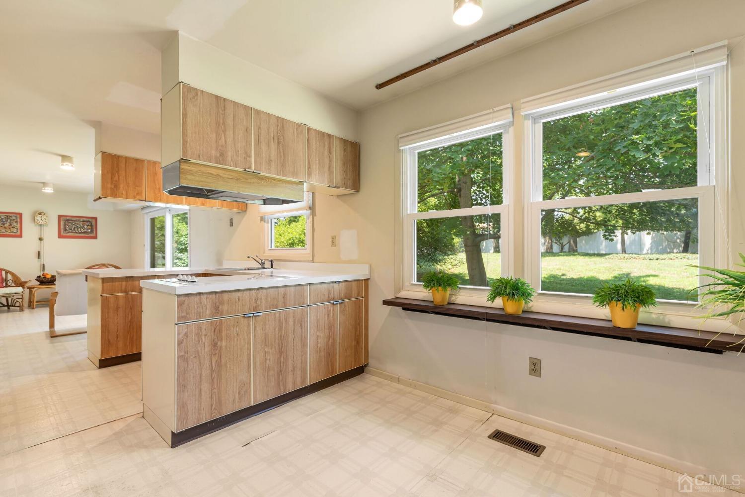 117 Drake Road Somerset, NJ 08873 - Photo 18 of 42 a kitchen with a sink and large window