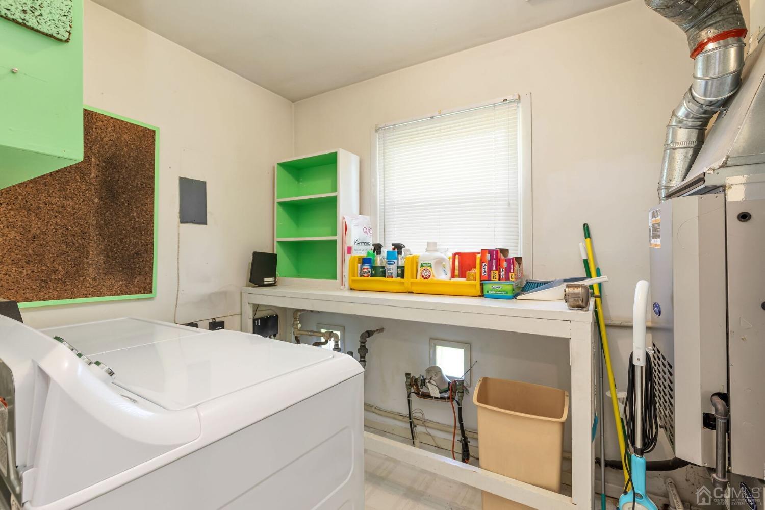 117 Drake Road Somerset, NJ 08873 - Photo 21 of 42 a bathroom with a sink and a mirror