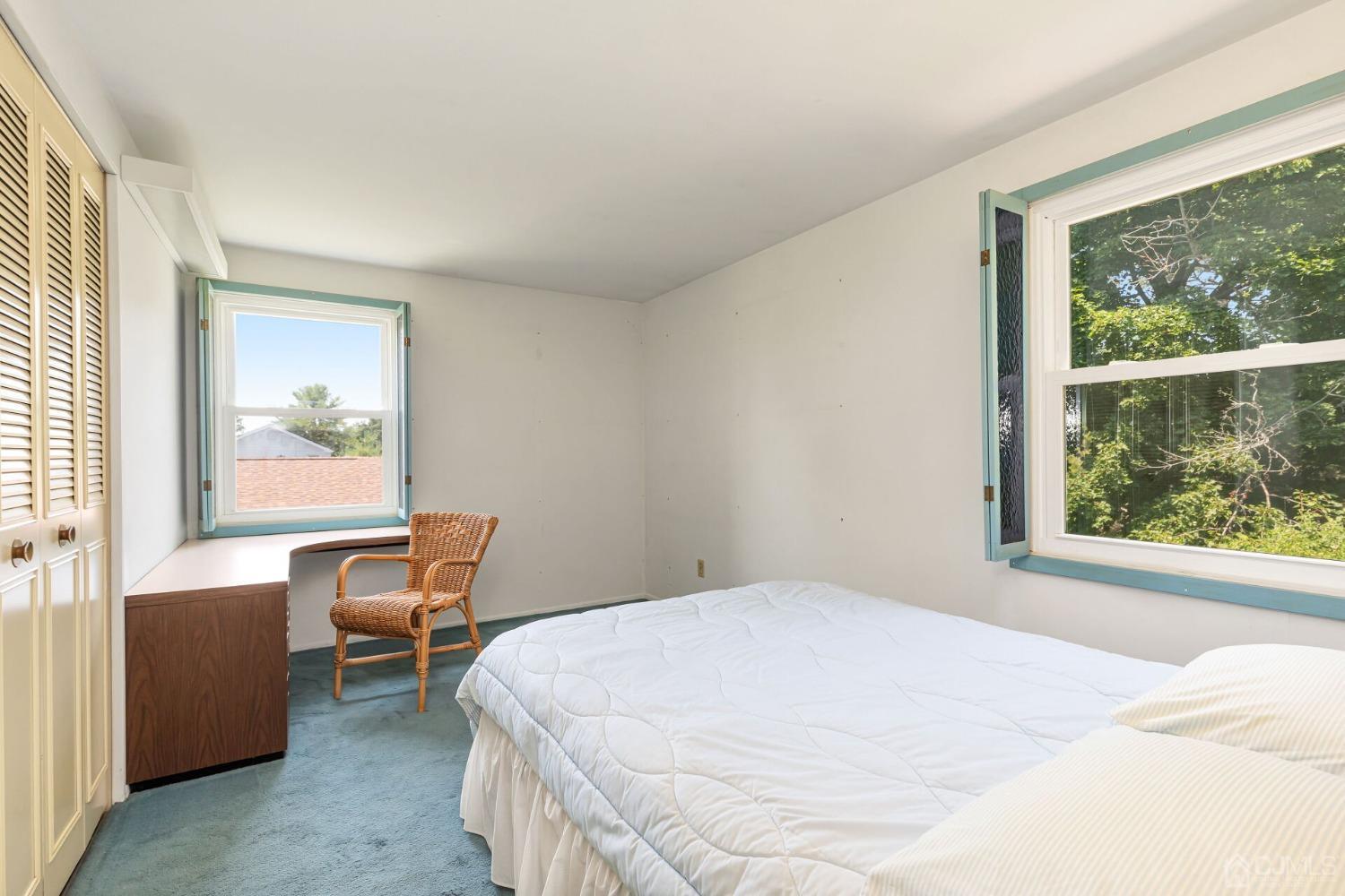 117 Drake Road Somerset, NJ 08873 - Photo 26 of 42 a bedroom with a bed and a large window
