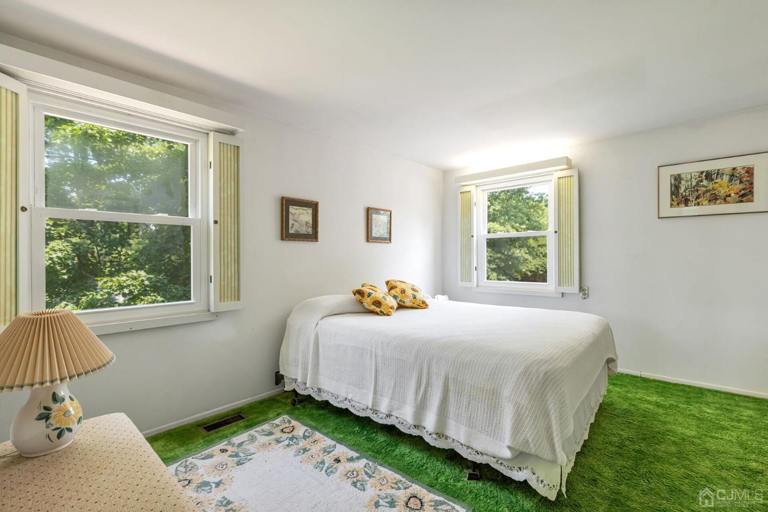 117 Drake Road Somerset, NJ 08873 - Photo 29 of 42 a bedroom with a bed and a window