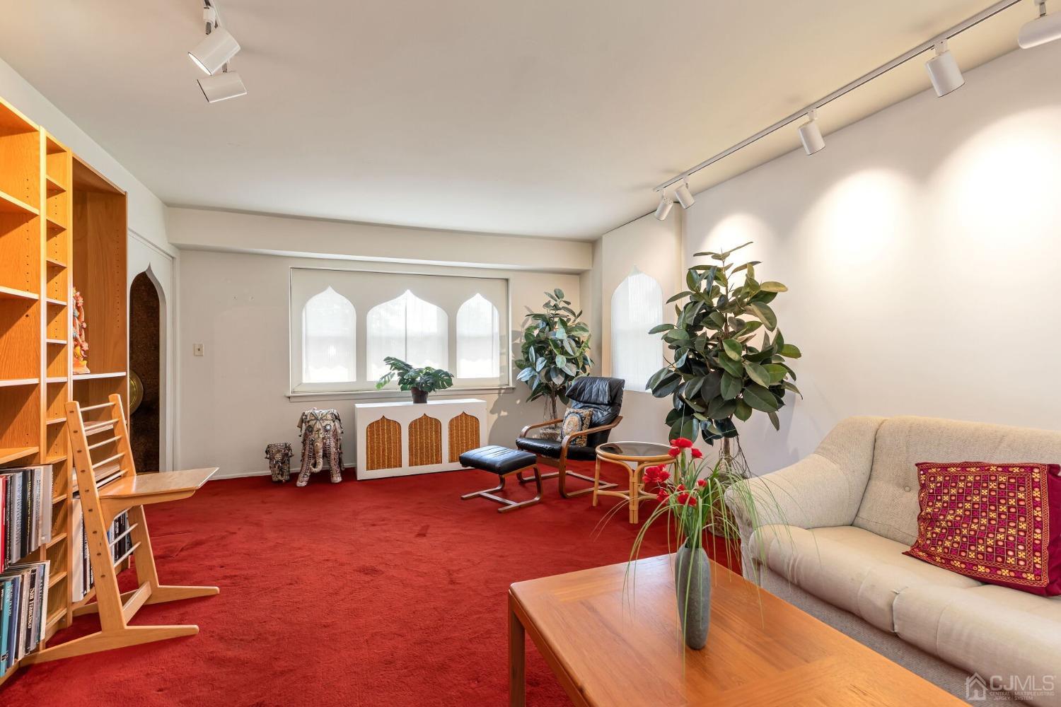 117 Drake Road Somerset, NJ 08873 - Photo 5 of 42 a living room with furniture a window and a flat screen tv