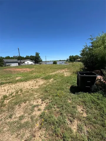 a view of a ocean with a car park
