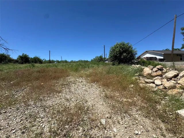 a view of a yard with an ocean