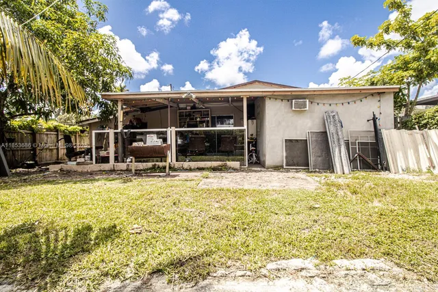 a view of a house with a swimming pool
