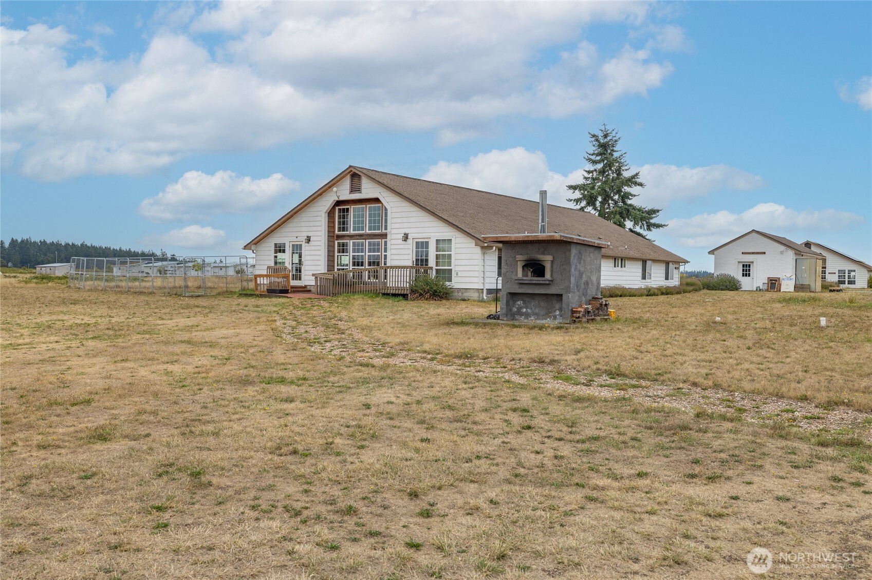 180 Parker Road Coupeville, WA 98239 - Photo 3 of 12 a house view with a garden space