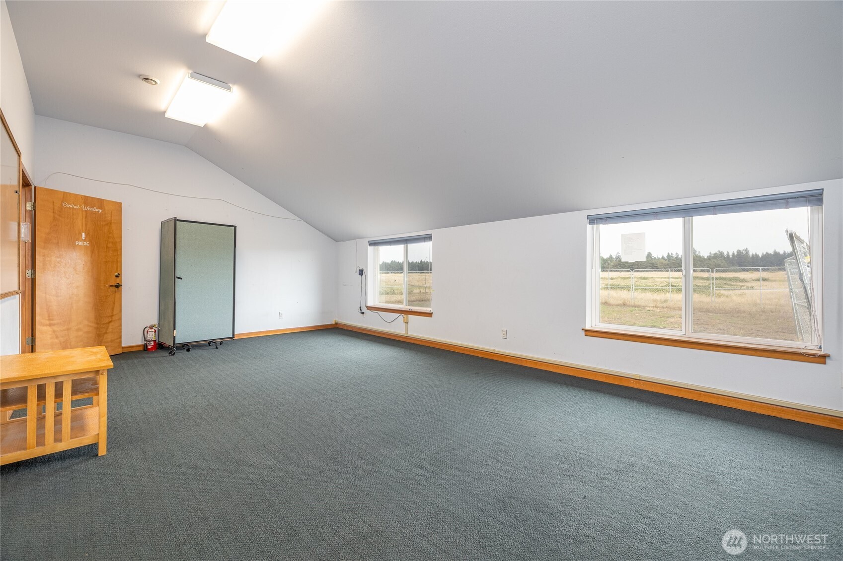 180 Parker Road Coupeville, WA 98239 - Photo 6 of 12 an empty room with windows and view
