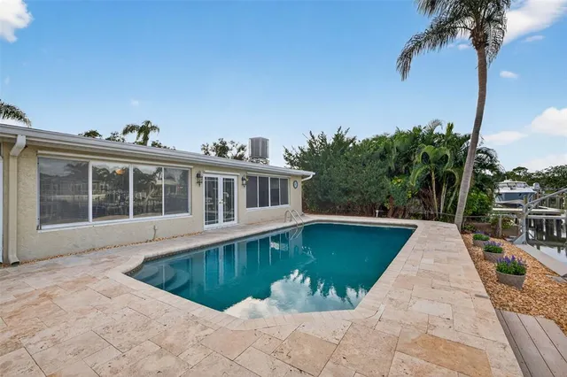 a view of a house with swimming pool